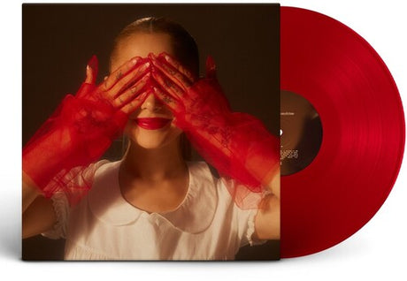 Ariana Grande - eternal sunshine album cover shown with ruby red colored vinyl record