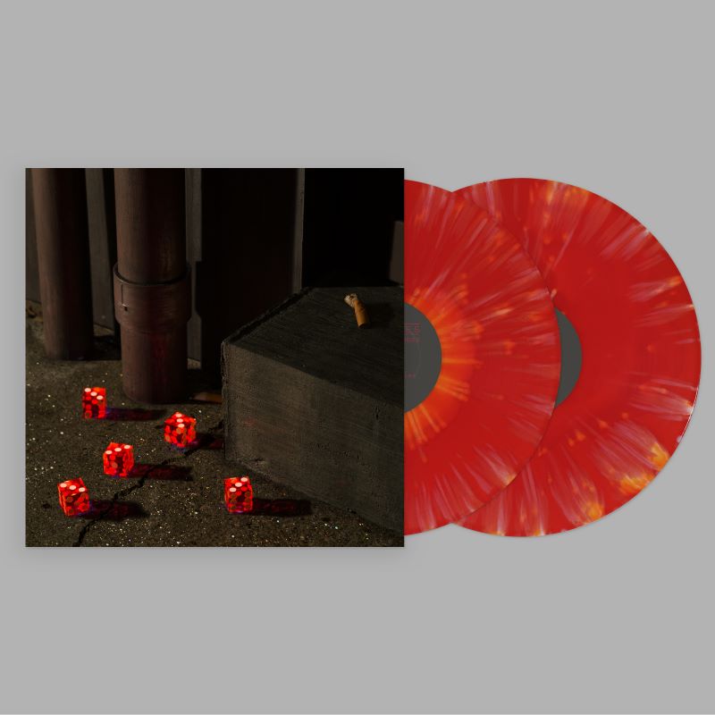 Bright Eyes "Five Dice, All Threes" album cover, shown with 2 red and orange splatter colored vinyl records