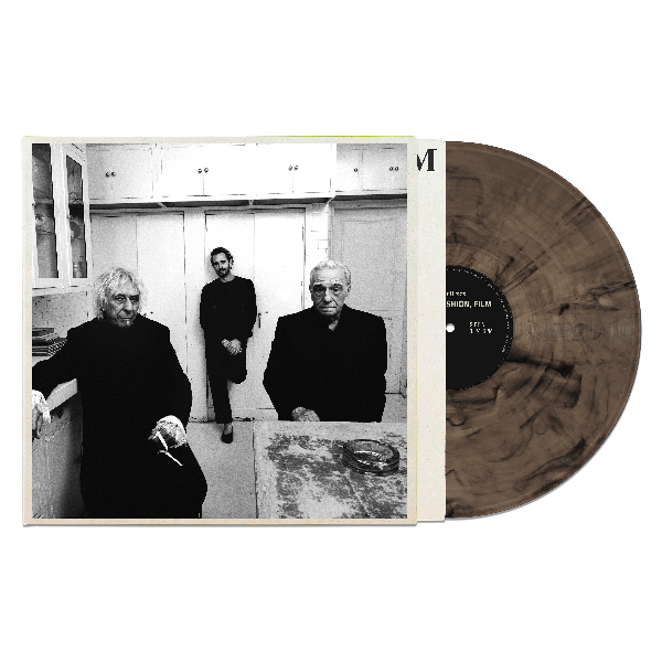 Charli XCX "Music, Fashion, Film" album cover featuring a black and white photo of three people on the cover. Shown with a marbled smoke colored vinyl record.