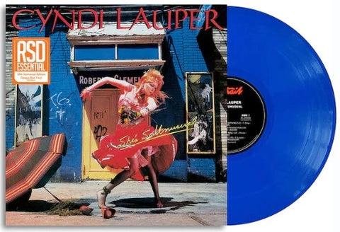 Cyndi Lauper - She's So Unusual album cover and blue vinyl. 