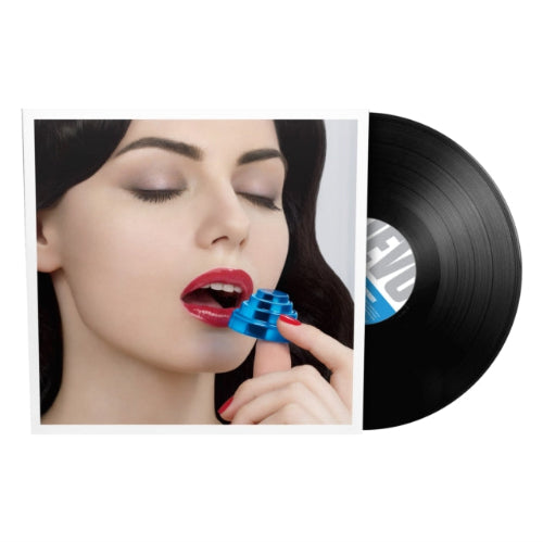 Devo - Something For Everybody album cover with black vinyl  