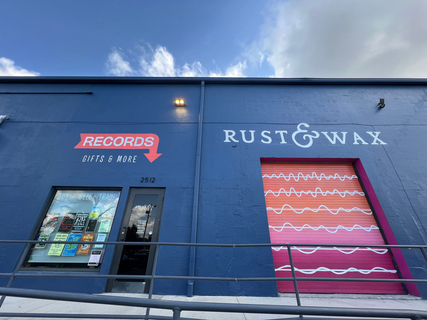 Image showing the front entrance door and garage to Rust & Wax Record Shop