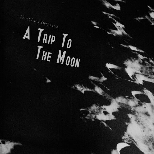 A Trip To The Moon (Sea Glass w/ Black Splatter Vinyl) – Rust