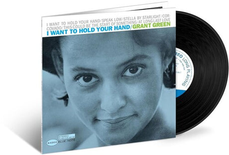 Grant Green - I Want To Hold Your Hand album cover and black vinyl. 