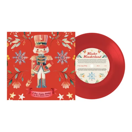 A Very Laufey Holiday: Winter Wonderland Edition album cover shown with red 7 inch vinyl record