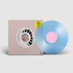 Mac Miller - The Divine Feminine album cover shown with Indie Exclusive light blue transparent colored vinyl record