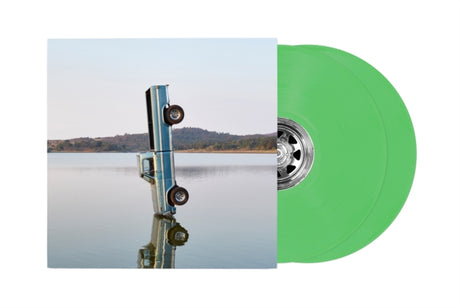 Post Malone "F-1 Trillion" album cover shown with 2 light green colored vinyl records