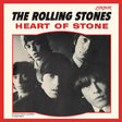 Album cover of 'Heart of Stone' by The Rolling Stones with red border and black and white photo of band members.