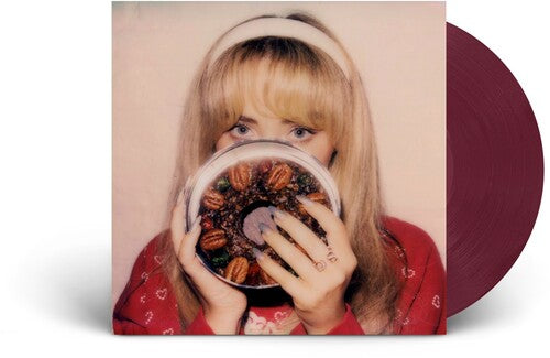 Sabrina Carpenter "Fruitcake" EP album cover shown with a "fruit punch" colored vinyl record