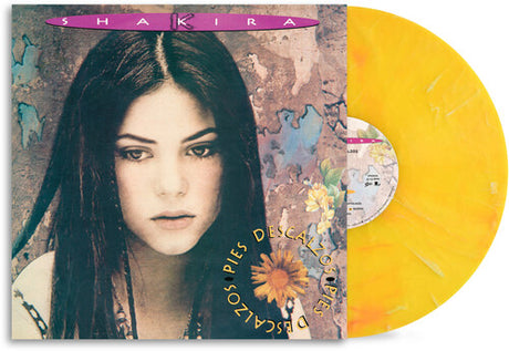 Shakira - Pies Descalzos album cover and yellow vinyl. 