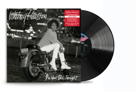 Whitney Houston - I’m Your Baby Tonight album cover and black vinyl. 
