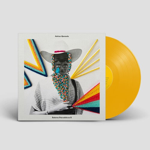 Adrian Quesada - Boleros Psicodelicos II album cover and yellow vinyl. 