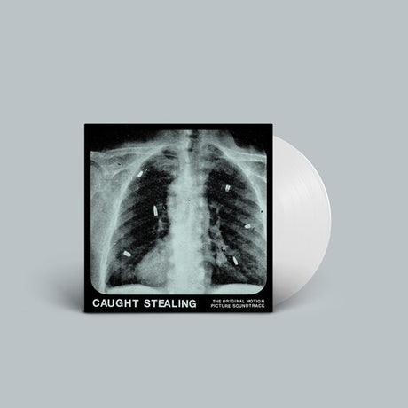Idles - Caught Stealing album cover and white vinyl. 