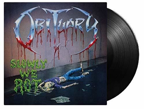 Obituary - Slowly We Rot album cover and vinyl