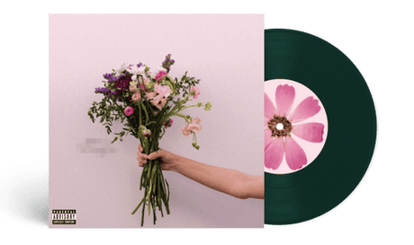 Olivia Rodrigo exclusive 7 inch album cover featuring a hand holding flowers, shown with a green vinyl record with a pink flower design on the label