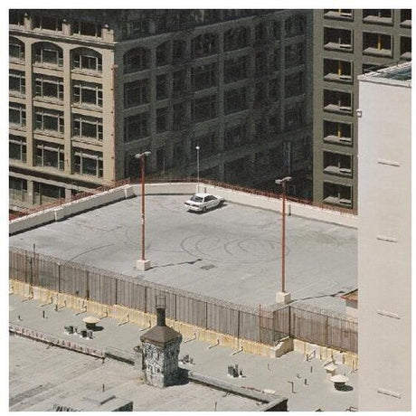 Arctic Monkeys - The Car album cover.