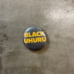 Black Uhuru Pin Front yellow text on black