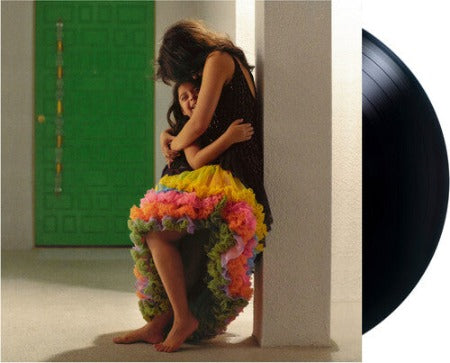 Camila Cabello - Familia album cover with black vinyl record