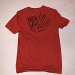 Rust & Wax "Fresh Wax" pizza box logo in black ink on the back of a red t-shirt