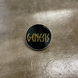 Genesis Enamel Pin Gold text on black backdrop