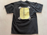 Vintage Pearl Jam Stickman Alive Shirt Black Rear View Image of Yellow Legal Pad Paper Taped to shirt with Ten tracklist