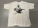 Vintage Lightnin' Hopkins Shirt - Front image showing black and white photo of Hopkins with guitar, text underneath reads Lightnin' Hopkins.  Some stains in pits and underneath image