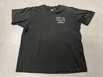 Rap Declares War Vintage Shirt - photo of front side with pocket print stating "WAR is back...and in the house" Black shirt with white text