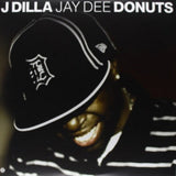 J Dilla - Donuts alternate smile album cover