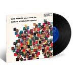 Lee Konitz plays with the Gerry Mulligan Quartet album cover with black vinyl record