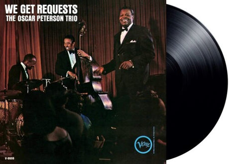 The Oscar Peterson Trio - We Get Requests album cover and black vinyl.