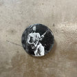 Pete Townshend Pin Front - image of Pete playing guitar against black backdrop