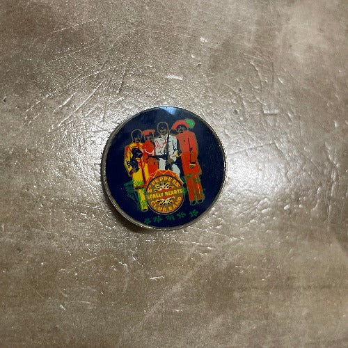 Sold at Auction: Band pins, patches, bumper stickers, Beatles