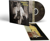 St. Vincent - Daddy's Home album cover with warm grey colored vinyl record and poster