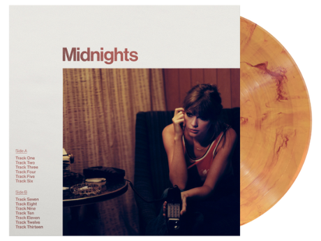 Taylor Swift - Midnights Blood Moon Edition album cover with yellowish-red marble vinyl record