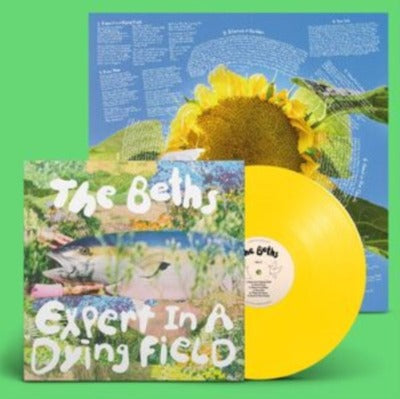 The Beths - Expert in a Dying Field album cover, with yellow vinyl record and image of the back cover of the album