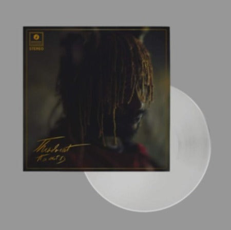 Thundercat - It Is What It Is album cover with clear vinyl record