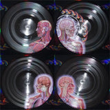 Tool Lateralus records, showing 4 black vinyl records each with a different image on the disc