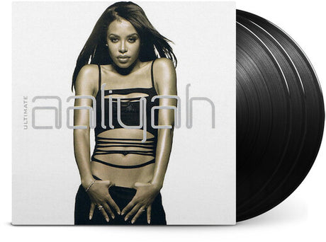 Aaliyah - Ultimate Aaliyah album cover and three black vinyl.