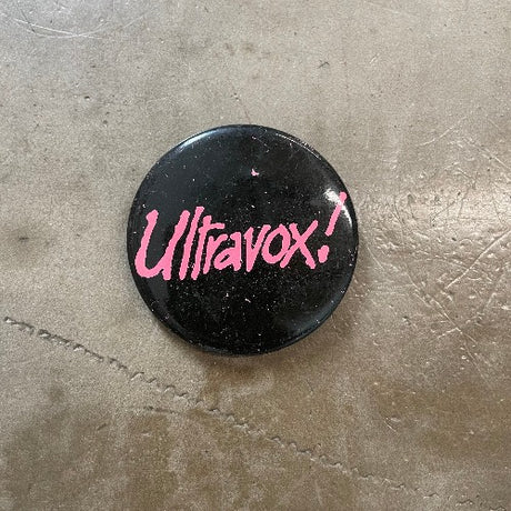 Ultravox! Pin front - pink text on black backdrop
