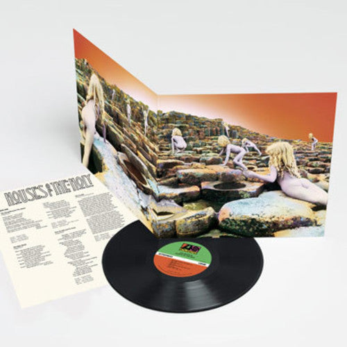 Led Zeppelin - Houses of the Holy album cover and black vinyl.