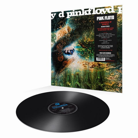 Pink Floyd - A Saucerful of Secrets album cover and black vinyl.